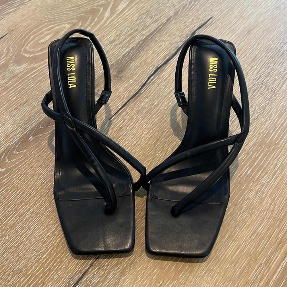 Strappy black kitten heels